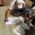 内容核验编辑王信达的工作照，负责数据与信息核验